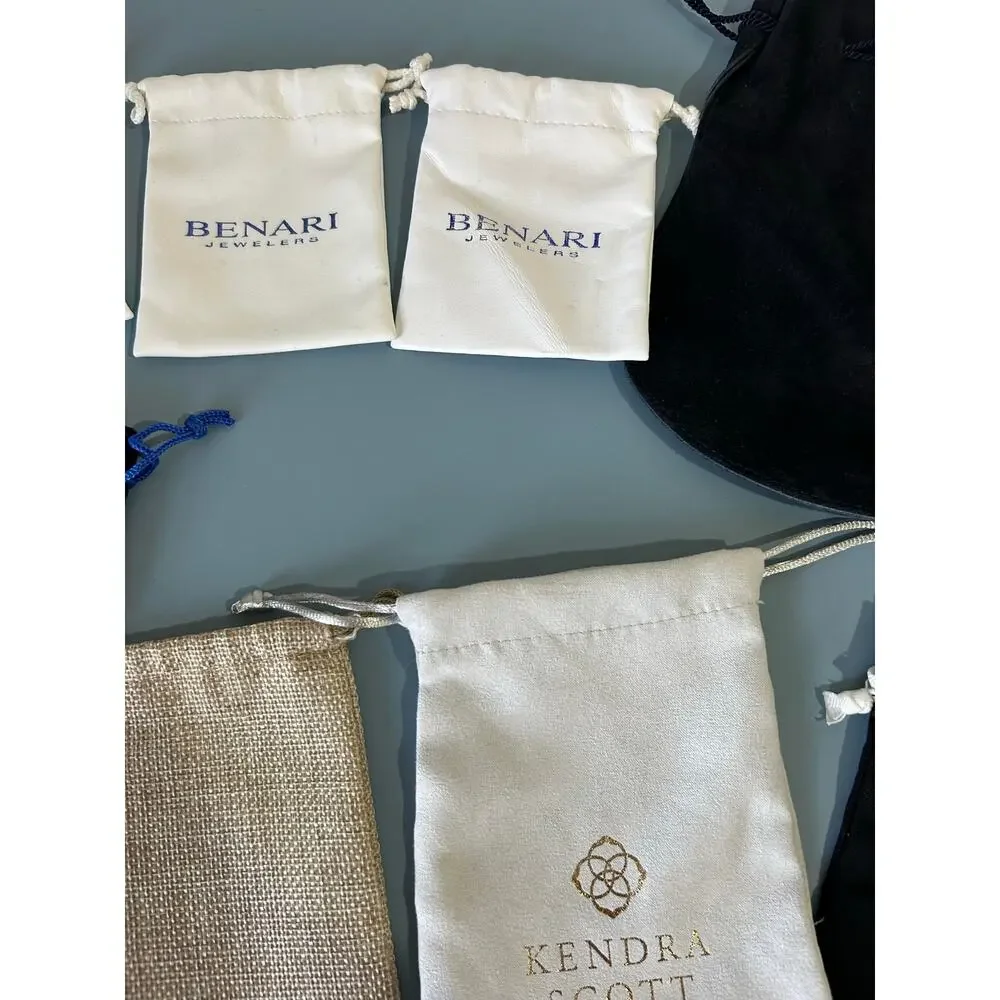 Collection of jewelry bags pouches gift bags various sizes and materials